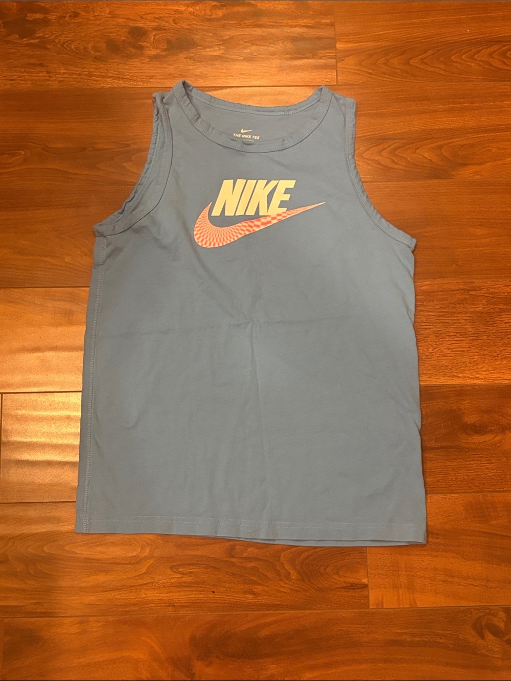 Nike Kids Blue Sleeveless Tank with Yellow & Peach Logo Size X-Large